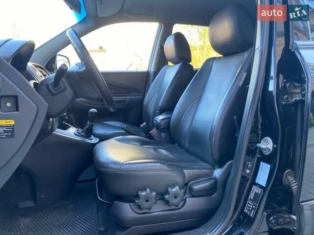 Черный Хендай Туксон, объемом двигателя 1.98 л и пробегом 286 тыс. км за 7300 $, фото 20 на Automoto.ua