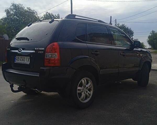 Чорний Хендай Туксон, об'ємом двигуна 1.99 л та пробігом 229 тис. км за 8199 $, фото 7 на Automoto.ua