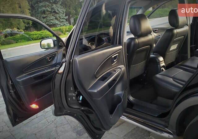 Черный Хендай Туксон, объемом двигателя 2 л и пробегом 230 тыс. км за 8600 $, фото 188 на Automoto.ua