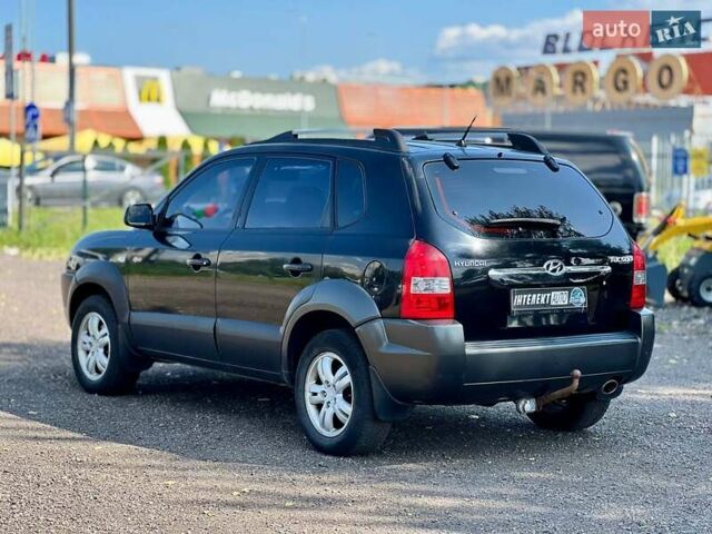Черный Хендай Туксон, объемом двигателя 2 л и пробегом 227 тыс. км за 8200 $, фото 3 на Automoto.ua