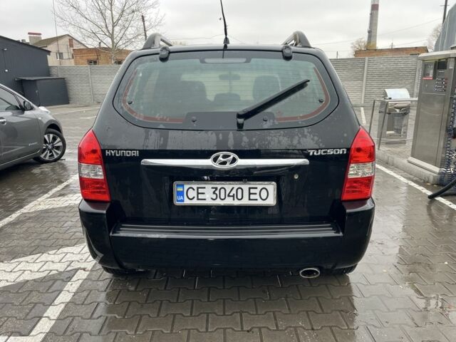 Черный Хендай Туксон, объемом двигателя 2 л и пробегом 177 тыс. км за 8500 $, фото 2 на Automoto.ua