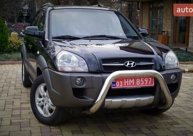 Чорний Хендай Туксон, об'ємом двигуна 2 л та пробігом 229 тис. км за 8600 $, фото 7 на Automoto.ua