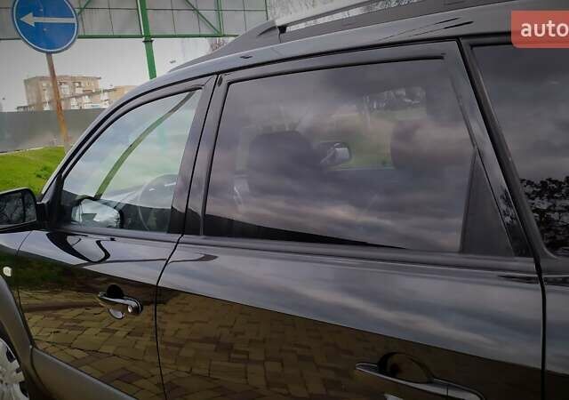 Чорний Хендай Туксон, об'ємом двигуна 2 л та пробігом 229 тис. км за 8600 $, фото 90 на Automoto.ua