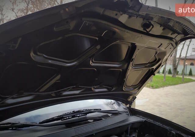 Чорний Хендай Туксон, об'ємом двигуна 2 л та пробігом 229 тис. км за 8600 $, фото 148 на Automoto.ua