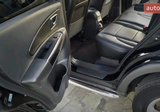 Черный Хендай Туксон, объемом двигателя 2 л и пробегом 230 тыс. км за 8600 $, фото 190 на Automoto.ua