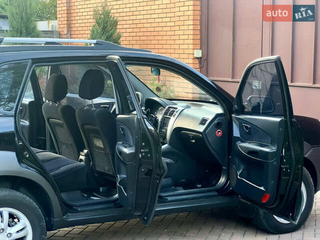 Чорний Хендай Туксон, об'ємом двигуна 1.98 л та пробігом 164 тис. км за 7950 $, фото 6 на Automoto.ua