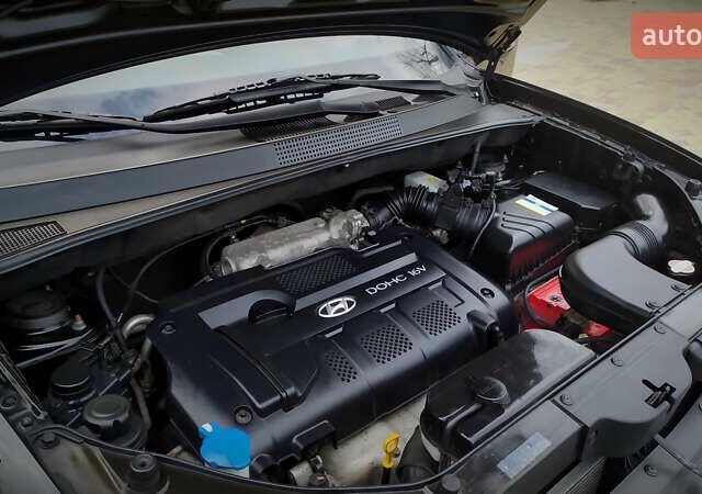 Чорний Хендай Туксон, об'ємом двигуна 2 л та пробігом 229 тис. км за 8600 $, фото 147 на Automoto.ua