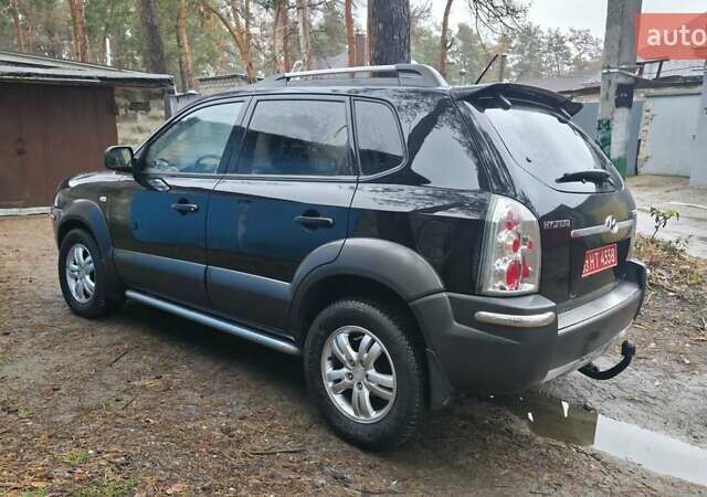 Чорний Хендай Туксон, об'ємом двигуна 2 л та пробігом 207 тис. км за 8200 $, фото 7 на Automoto.ua