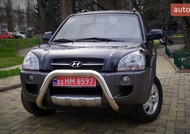 Чорний Хендай Туксон, об'ємом двигуна 2 л та пробігом 229 тис. км за 8600 $, фото 6 на Automoto.ua