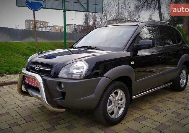 Чорний Хендай Туксон, об'ємом двигуна 2 л та пробігом 229 тис. км за 8600 $, фото 13 на Automoto.ua