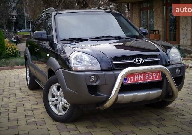 Чорний Хендай Туксон, об'ємом двигуна 2 л та пробігом 229 тис. км за 8600 $, фото 10 на Automoto.ua