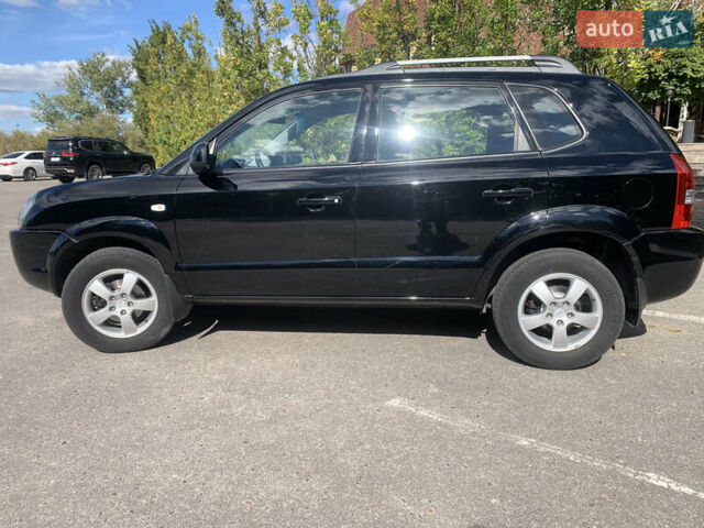 Чорний Хендай Туксон, об'ємом двигуна 2 л та пробігом 56 тис. км за 9500 $, фото 36 на Automoto.ua