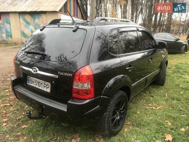 Черный Хендай Туксон, объемом двигателя 2 л и пробегом 210 тыс. км за 8999 $, фото 22 на Automoto.ua