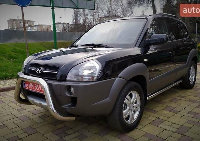 Чорний Хендай Туксон, об'ємом двигуна 2 л та пробігом 229 тис. км за 8600 $, фото 14 на Automoto.ua