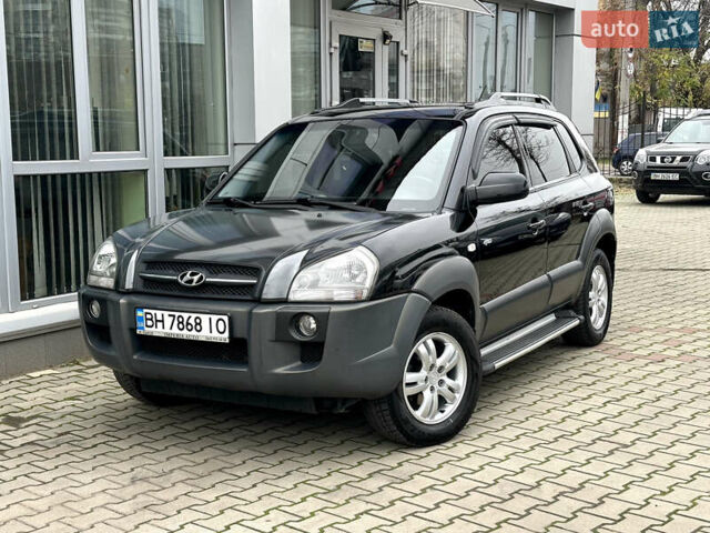 Чорний Хендай Туксон, об'ємом двигуна 2.66 л та пробігом 145 тис. км за 8900 $, фото 1 на Automoto.ua
