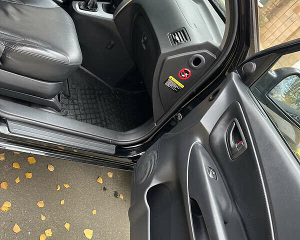 Черный Хендай Туксон, объемом двигателя 1.98 л и пробегом 99 тыс. км за 8999 $, фото 11 на Automoto.ua