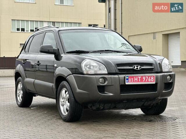 Чорний Хендай Туксон, об'ємом двигуна 2 л та пробігом 230 тис. км за 6850 $, фото 19 на Automoto.ua