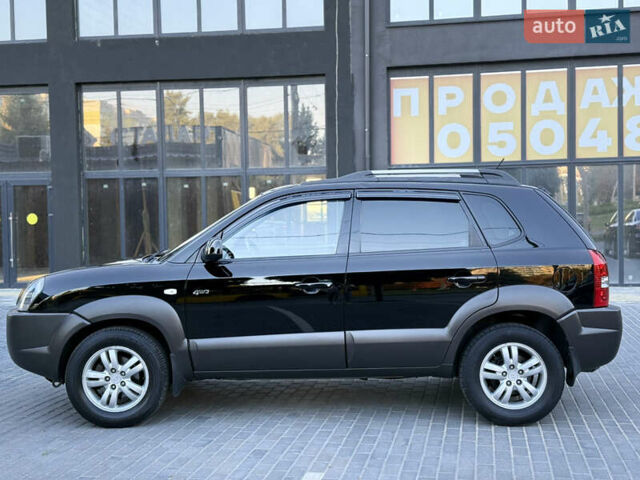 Чорний Хендай Туксон, об'ємом двигуна 1.98 л та пробігом 205 тис. км за 7700 $, фото 12 на Automoto.ua