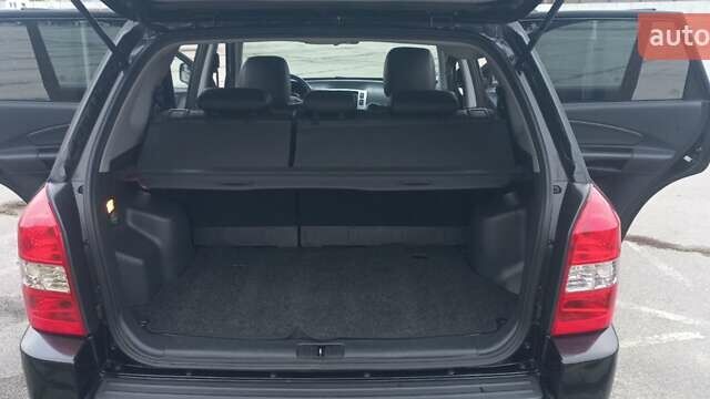 Черный Хендай Туксон, объемом двигателя 1.98 л и пробегом 155 тыс. км за 7999 $, фото 52 на Automoto.ua