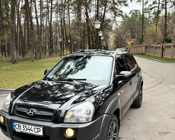 Черный Хендай Туксон, объемом двигателя 1.99 л и пробегом 266 тыс. км за 7500 $, фото 18 на Automoto.ua