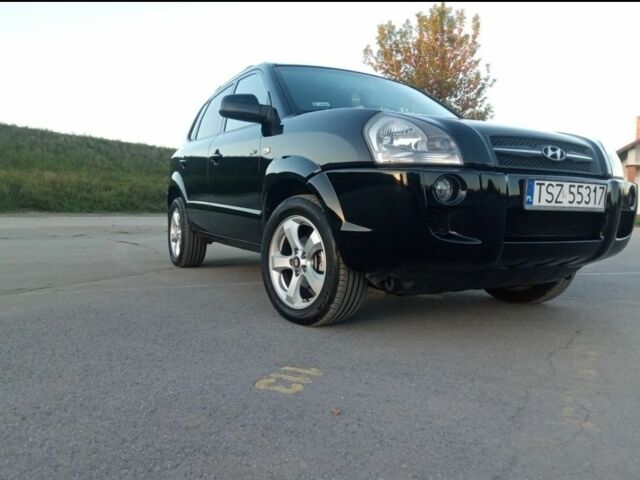 Черный Хендай Туксон, объемом двигателя 2 л и пробегом 240 тыс. км за 2700 $, фото 3 на Automoto.ua