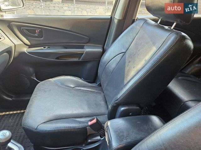 Чорний Хендай Туксон, об'ємом двигуна 2 л та пробігом 152 тис. км за 7950 $, фото 18 на Automoto.ua