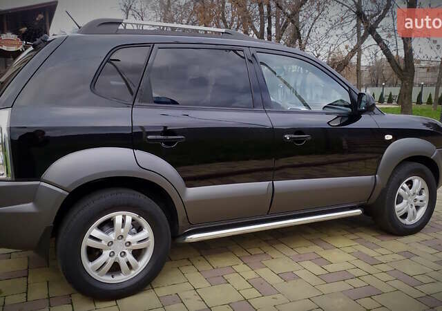 Чорний Хендай Туксон, об'ємом двигуна 2 л та пробігом 229 тис. км за 8600 $, фото 17 на Automoto.ua