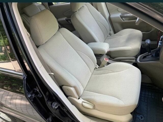 Черный Хендай Туксон, объемом двигателя 2 л и пробегом 208 тыс. км за 8100 $, фото 7 на Automoto.ua