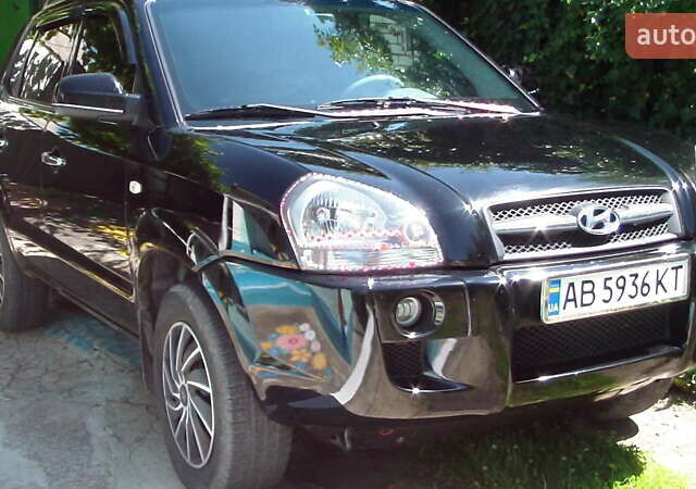 Черный Хендай Туксон, объемом двигателя 1.98 л и пробегом 234 тыс. км за 7800 $, фото 7 на Automoto.ua