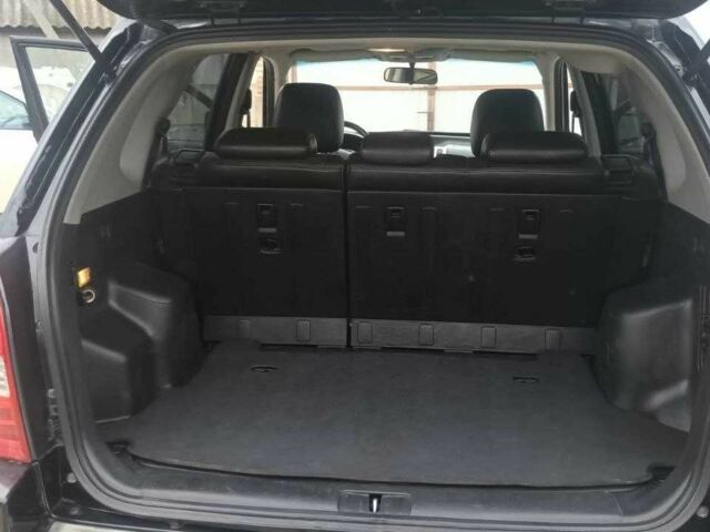 Черный Хендай Туксон, объемом двигателя 2 л и пробегом 200 тыс. км за 8300 $, фото 9 на Automoto.ua