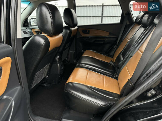 Чорний Хендай Туксон, об'ємом двигуна 2 л та пробігом 230 тис. км за 6850 $, фото 14 на Automoto.ua