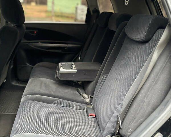 Черный Хендай Туксон, объемом двигателя 1.99 л и пробегом 266 тыс. км за 7500 $, фото 8 на Automoto.ua