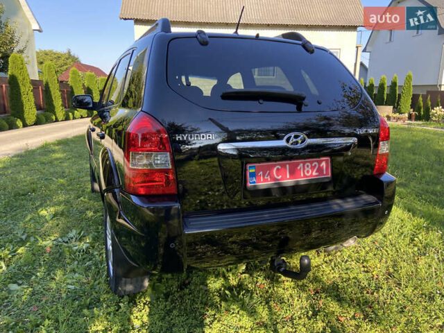 Черный Хендай Туксон, объемом двигателя 1.98 л и пробегом 197 тыс. км за 8000 $, фото 19 на Automoto.ua