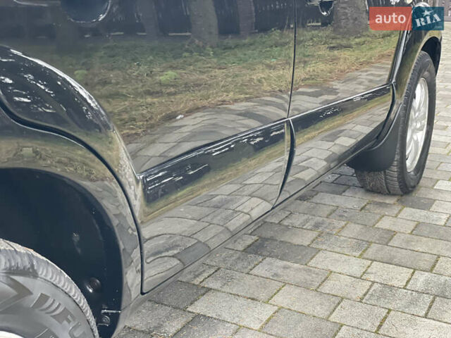 Черный Хендай Туксон, объемом двигателя 2 л и пробегом 180 тыс. км за 7700 $, фото 13 на Automoto.ua