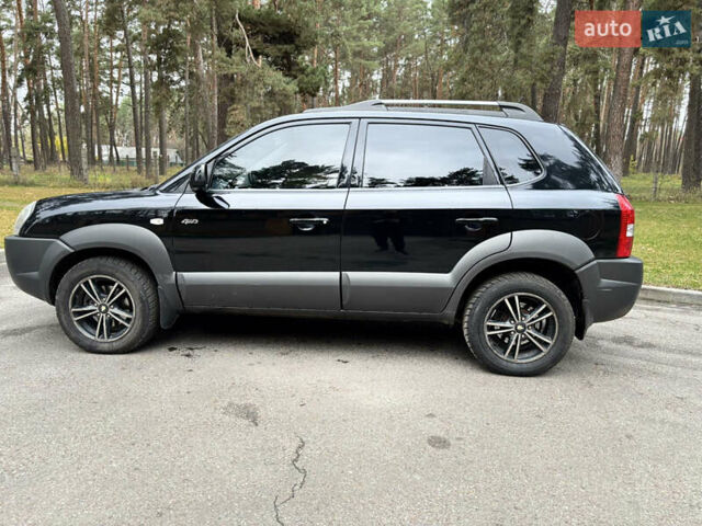 Черный Хендай Туксон, объемом двигателя 1.99 л и пробегом 266 тыс. км за 7500 $, фото 14 на Automoto.ua