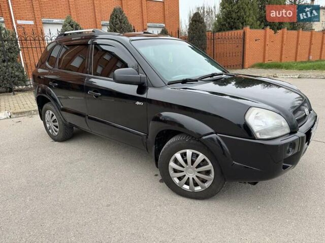 Черный Хендай Туксон, объемом двигателя 2 л и пробегом 240 тыс. км за 7499 $, фото 8 на Automoto.ua