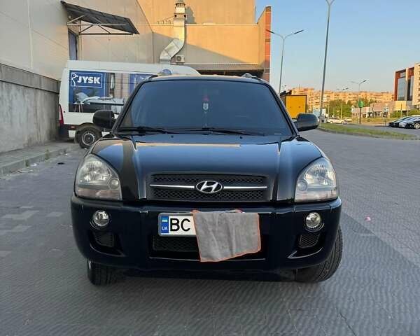 Черный Хендай Туксон, объемом двигателя 1.99 л и пробегом 231 тыс. км за 8500 $, фото 8 на Automoto.ua