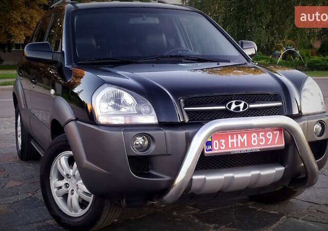 Черный Хендай Туксон, объемом двигателя 2 л и пробегом 230 тыс. км за 8600 $, фото 92 на Automoto.ua