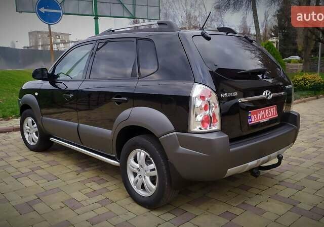 Чорний Хендай Туксон, об'ємом двигуна 2 л та пробігом 229 тис. км за 8600 $, фото 48 на Automoto.ua
