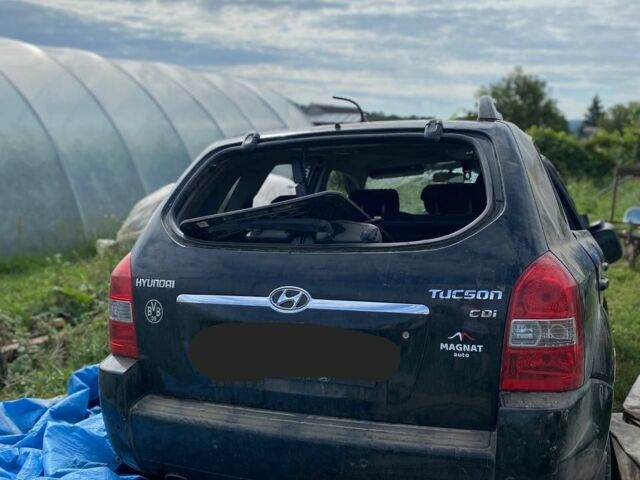 Черный Хендай Туксон, объемом двигателя 2 л и пробегом 250 тыс. км за 3500 $, фото 2 на Automoto.ua