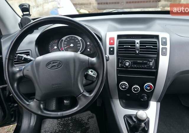 Чорний Хендай Туксон, об'ємом двигуна 2 л та пробігом 207 тис. км за 8200 $, фото 31 на Automoto.ua