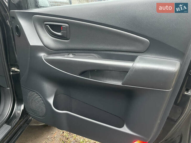 Черный Хендай Туксон, объемом двигателя 2 л и пробегом 180 тыс. км за 7700 $, фото 32 на Automoto.ua