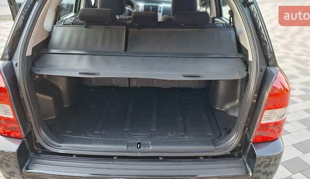 Черный Хендай Туксон, объемом двигателя 2 л и пробегом 190 тыс. км за 8150 $, фото 25 на Automoto.ua