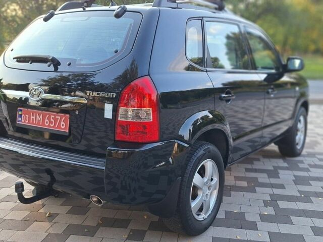 Чорний Хендай Туксон, об'ємом двигуна 2 л та пробігом 190 тис. км за 8300 $, фото 10 на Automoto.ua