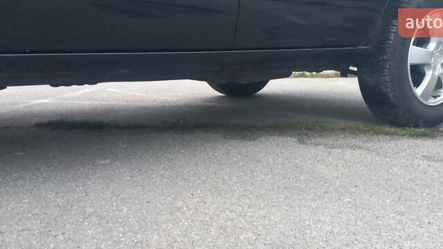 Черный Хендай Туксон, объемом двигателя 1.98 л и пробегом 155 тыс. км за 7999 $, фото 22 на Automoto.ua