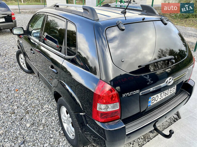 Черный Хендай Туксон, объемом двигателя 2 л и пробегом 224 тыс. км за 7750 $, фото 6 на Automoto.ua