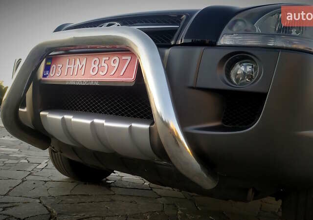 Черный Хендай Туксон, объемом двигателя 2 л и пробегом 230 тыс. км за 8600 $, фото 46 на Automoto.ua