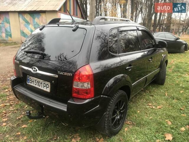 Черный Хендай Туксон, объемом двигателя 2 л и пробегом 210 тыс. км за 8999 $, фото 21 на Automoto.ua