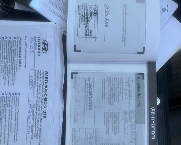 Чорний Хендай Туксон, об'ємом двигуна 2 л та пробігом 56 тис. км за 9500 $, фото 38 на Automoto.ua