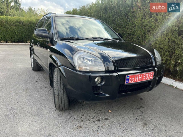 Черный Хендай Туксон, объемом двигателя 2 л и пробегом 256 тыс. км за 7800 $, фото 12 на Automoto.ua